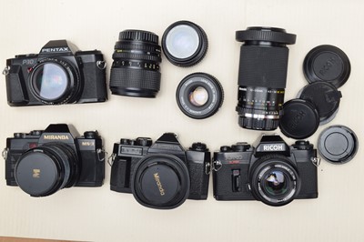Lot 411 - Four SLR Cameras