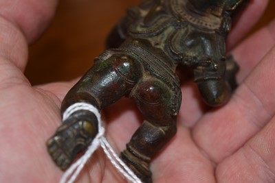Lot 17 - A bronze figure of Krishna the Butter Thief