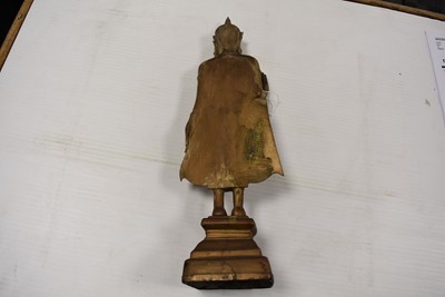 Lot 25 - A bronzed cast metal figure of a Standing Crowned Buddha in Abhayamundra