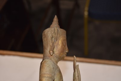 Lot 25 - A bronzed cast metal figure of a Standing Crowned Buddha in Abhayamundra