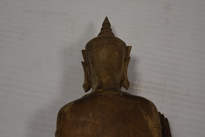 Lot 25 - A bronzed cast metal figure of a Standing Crowned Buddha in Abhayamundra