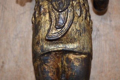 Lot 26 - A heavy bronze cast metal statue of a Hindu deity
