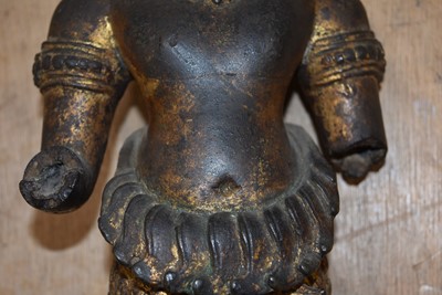 Lot 26 - A heavy bronze cast metal statue of a Hindu deity