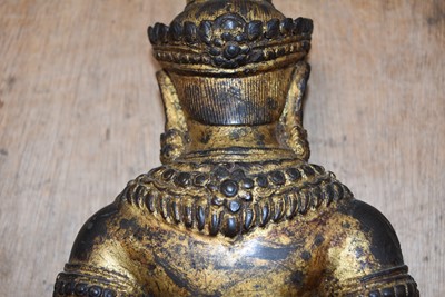 Lot 26 - A heavy bronze cast metal statue of a Hindu deity