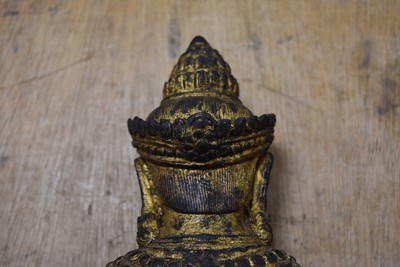 Lot 26 - A heavy bronze cast metal statue of a Hindu deity