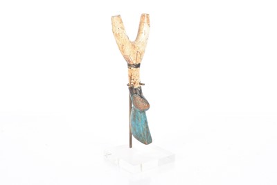Lot 409 - An African carved wooden sling shot