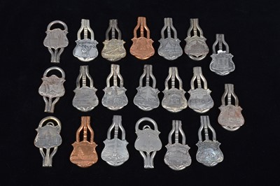 Lot 489 - A collection of steel and brass 19th Century folding commemorative or souvenir button hooks