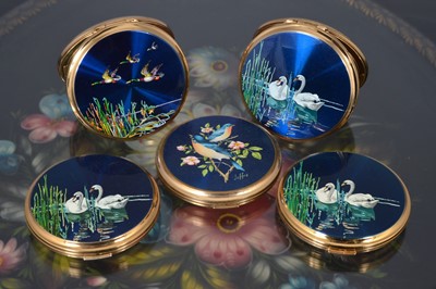 Lot 524 - Six 1960s circular gilt metal and coloured enamel decorated Stratton compacts
