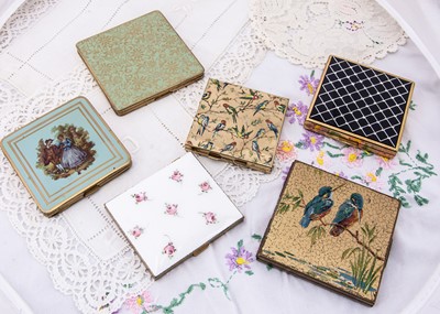 Lot 619 - Six various coloured enamelled compacts