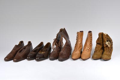 Lot 667 - A pair of light brown Victorian leather button boots