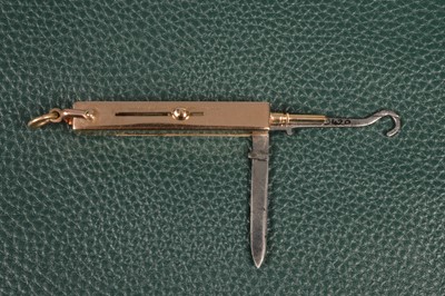 Lot 805 - A yellow metal Thronhill Multi-Tool/pocket knife