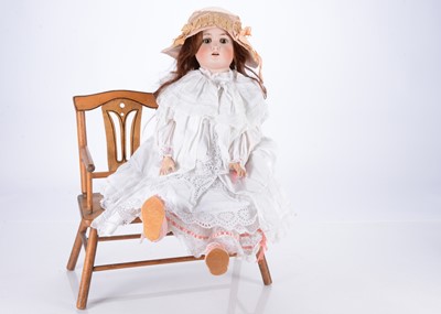 Lot 182 - A German bisque headed child doll marked Germany 14