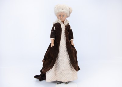 Lot 458 - A late 19th century German wax over composition lady doll
