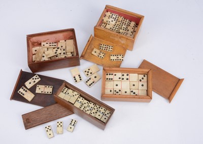 Lot 524 - Four small bone domino sets