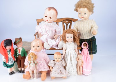 Lot 592 - A selection of hard plastic and vinyl dolls