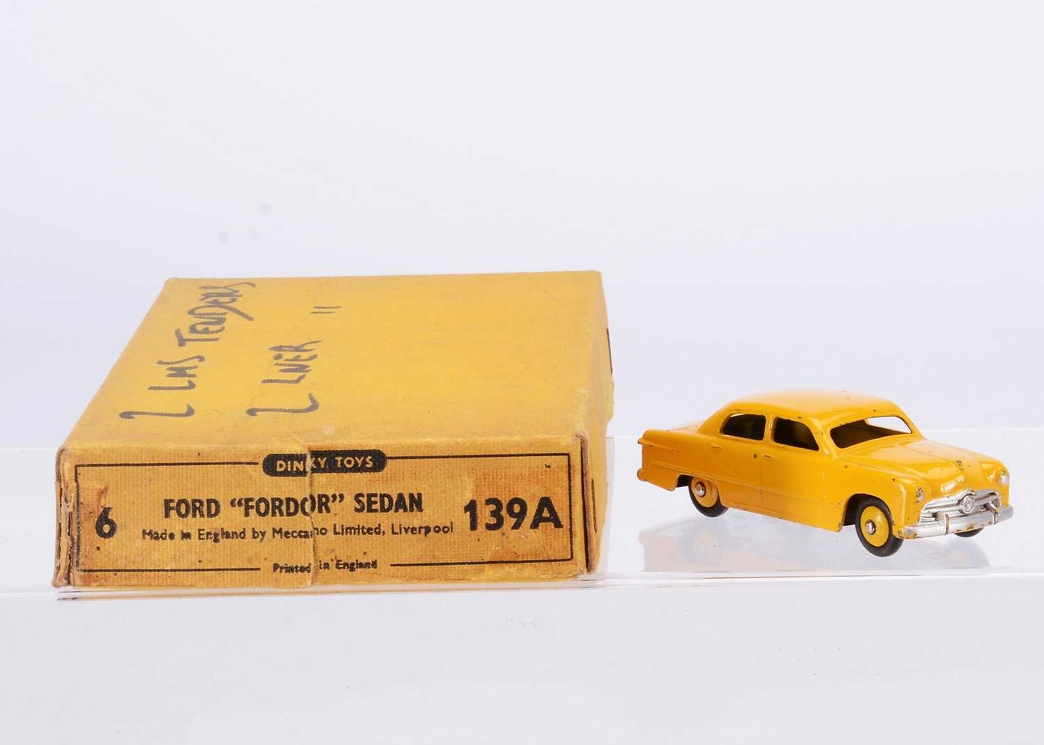 Lot 48 - A Dinky Toys 139a Ford Fordor Sedan Trade Box