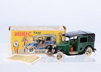 Lot 626 - A Tri-ang Minic Tinplate Clockwork 39M Pre-War Taxi Cab