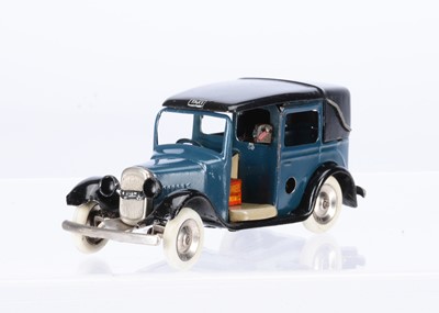 Lot 630 - A Tri-ang Minic Tinplate Clockwork 39M Pre-War Taxi Cab