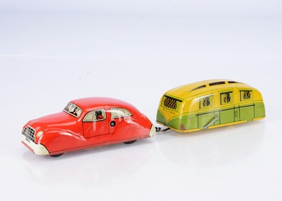 Lot 684 - A Mettoy Mechanical Car & Caravan Trailer No.3306/IT