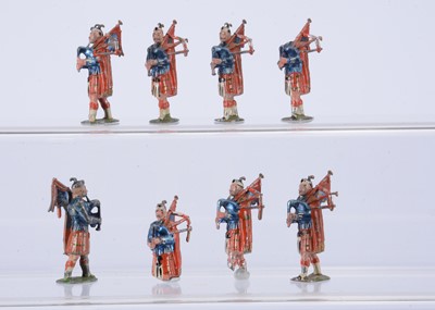 Lot 877 - Hanks Scots Guards Pipers - copies of Britains - circa 1900