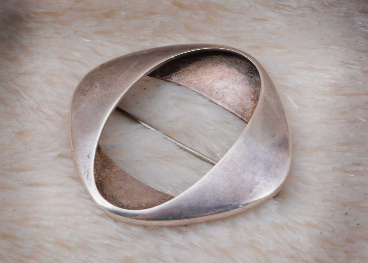 Lot 34 - A Georg Jensen for Henning Coppel silver brooch