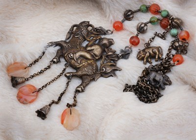 Lot 44 - A Chinese white metal and hardstone figural necklace