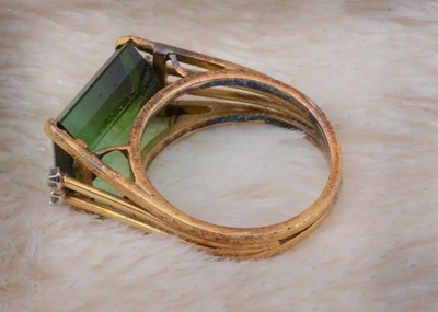 Lot 47 - A tourmaline and diamond set yellow metal dress ring
