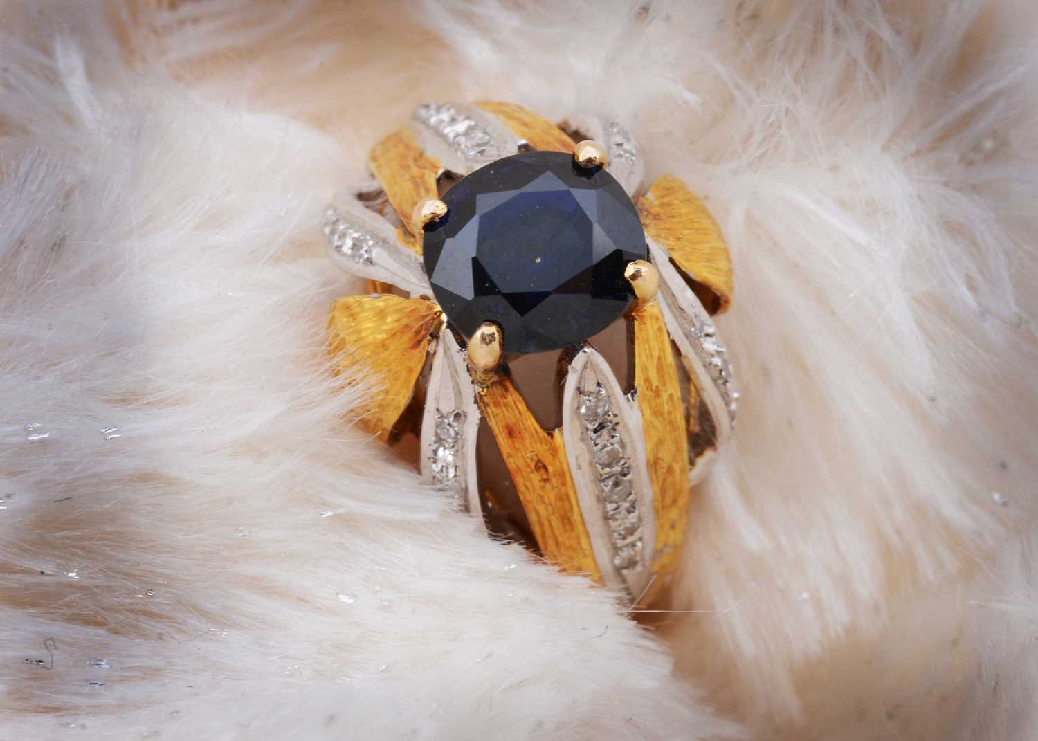 Lot 55 - A continental sapphire and diamond two colour 18k marked dress ring