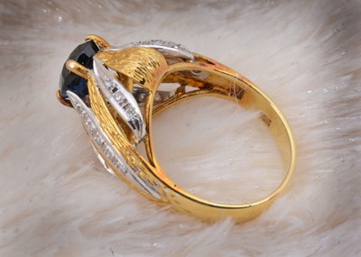 Lot 55 - A continental sapphire and diamond two colour 18k marked dress ring