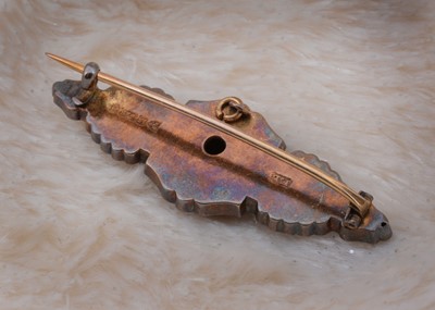 Lot 73 - A 15ct gold Victorian diamond and ruby bar brooch
