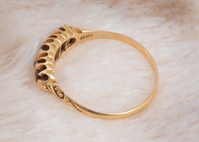 Lot 92 - An 18ct gold ruby and diamond five stone dress ring