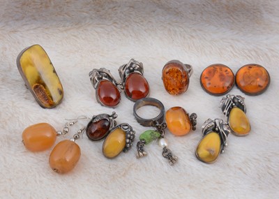 Lot 265 - Three continental silver and amber dress rings