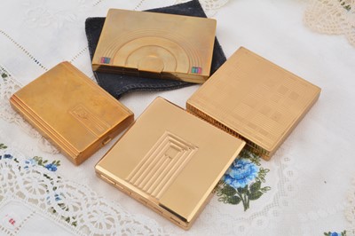 Lot 309 - Four gilt metal Art Deco style compacts