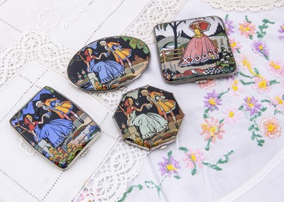 Lot 320 - Four Gwenda Art Deco foil tap flap compacts