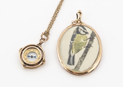Lot 13 - A 9ct gold fob compass