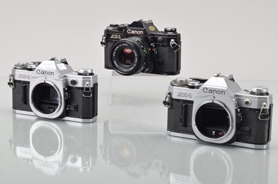 Lot 389 - Three Canon AE-1 SLR Cameras