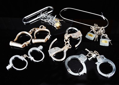 Lot 80 - Four sets of magic handcuffs
