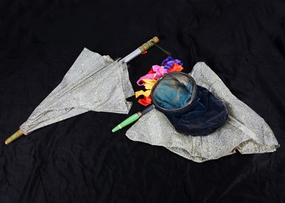 Lot 104 - A magic umbrella illusion trick