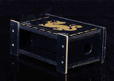 Lot 129 - A Supreme Magic painted dragon decorated illusion box
