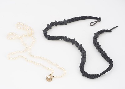 Lot 59 - A graduated string of cultured pearls