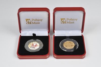Lot 50 - Two Elizabeth II Father Christmas coins