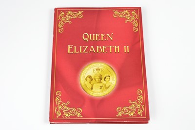 Lot 104 - A modern London Mint Office Queen Elizabeth II commemorative eight coin set