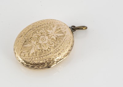 Lot 71 - An oval gold fronted locket