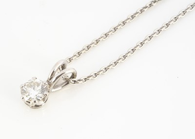 Lot 92 - A contemporary 18ct gold diamond drop solitaire pendant