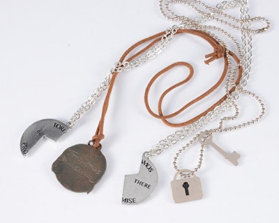 Lot 444 - Tori Amos / Tour Necklaces and Badges