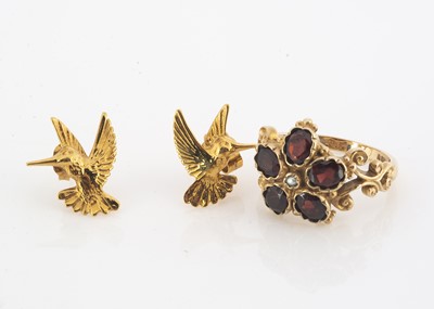 Lot 150 - A 9ct gold garnet and seed pearl Elizabethan style dress ring