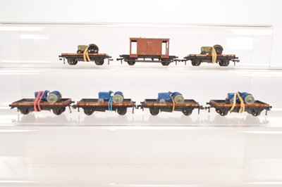Lot 180 - Four Hornby-Dublo 00 Gauge 2-Rail unboxed 4649 Low sided wagon with Dublo Dinky Tractor load and two with Master Model Tractor load and Brake Van (7)