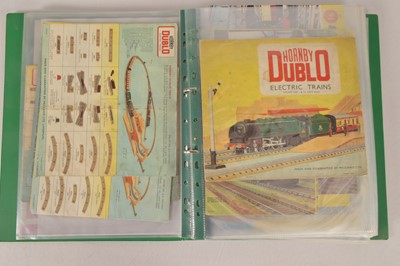 Lot 204 - Large collection of Hornby-Dublo 00 Gauge 2 and 3-Rail Catalogues and Layout booklets and other literature from 1938-1960's including Hornby AcHO and a few 0 Gauge leaflets mostly original a few (48)
