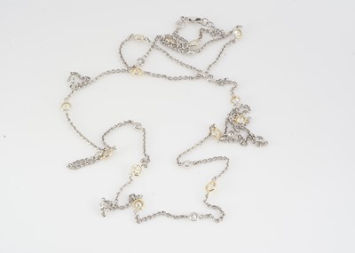 Lot 167 - An 18ct gold bi colour diamond necklace