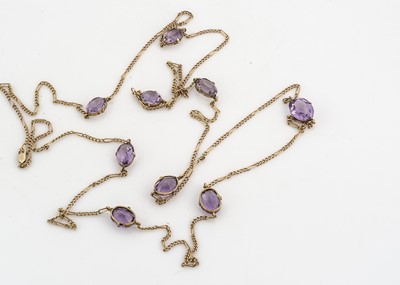 Lot 171 - An opera length 9ct gold curb link and amethyst necklace
